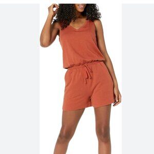 NWT women’s rust orange colored romper size Medium